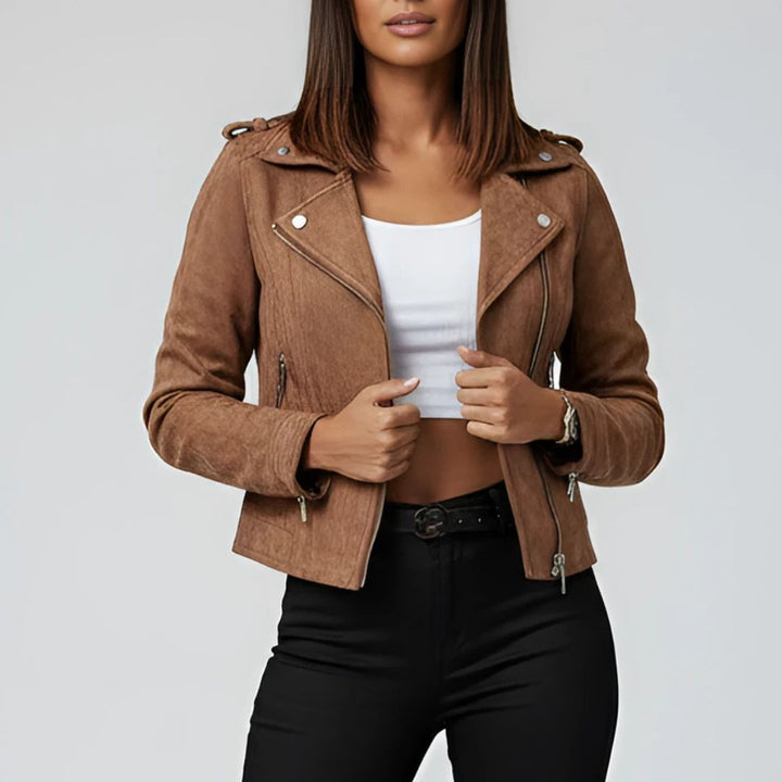 Brown suede jacket worn by a women on a plain background